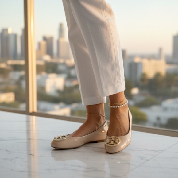 NWOT Tory Burch Cream Flats with Gold Logo